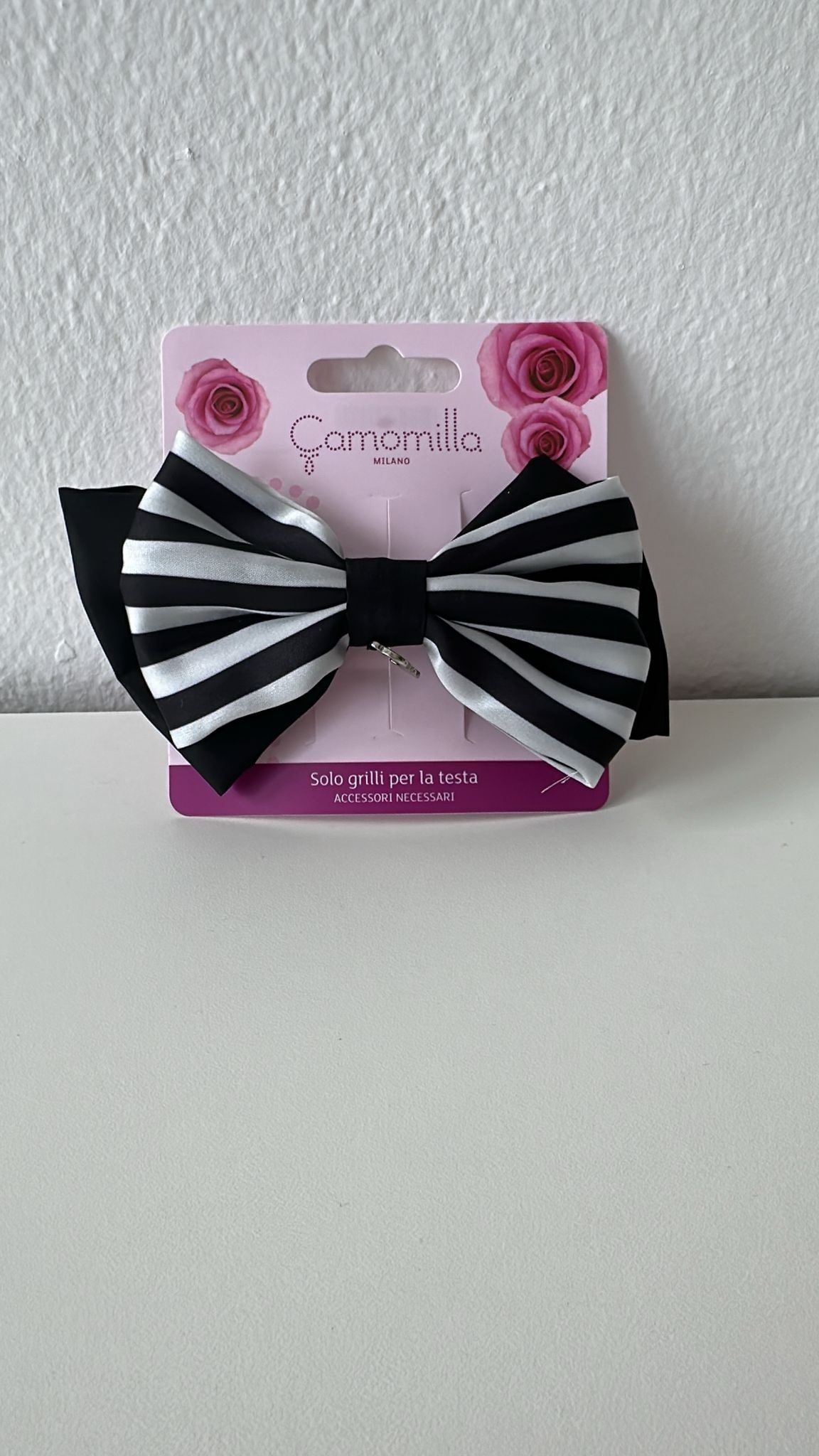 fERMAGLIO CAPELLI RIGHE